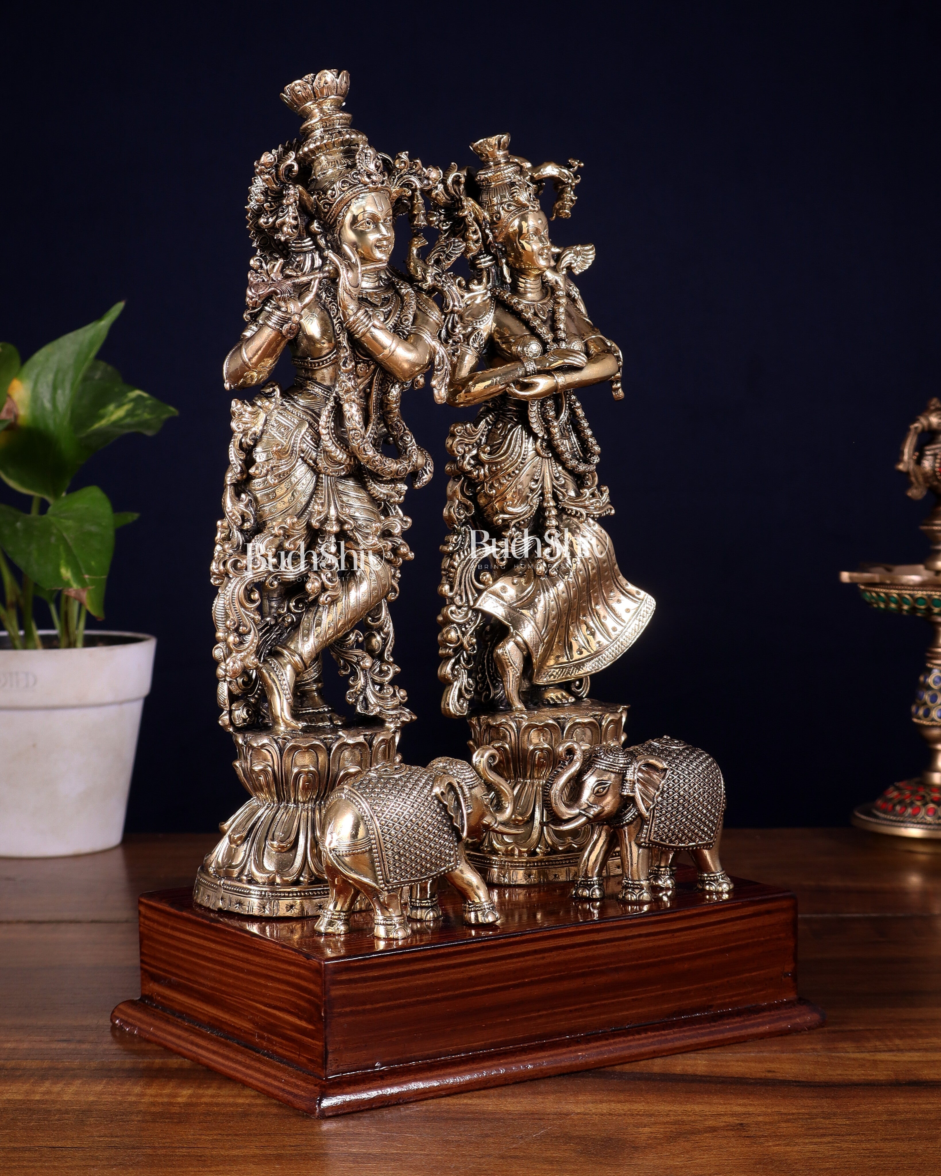 Brass Radha Krishna with Elephants on Wooden Base – Superfine Finish 11.5 inch