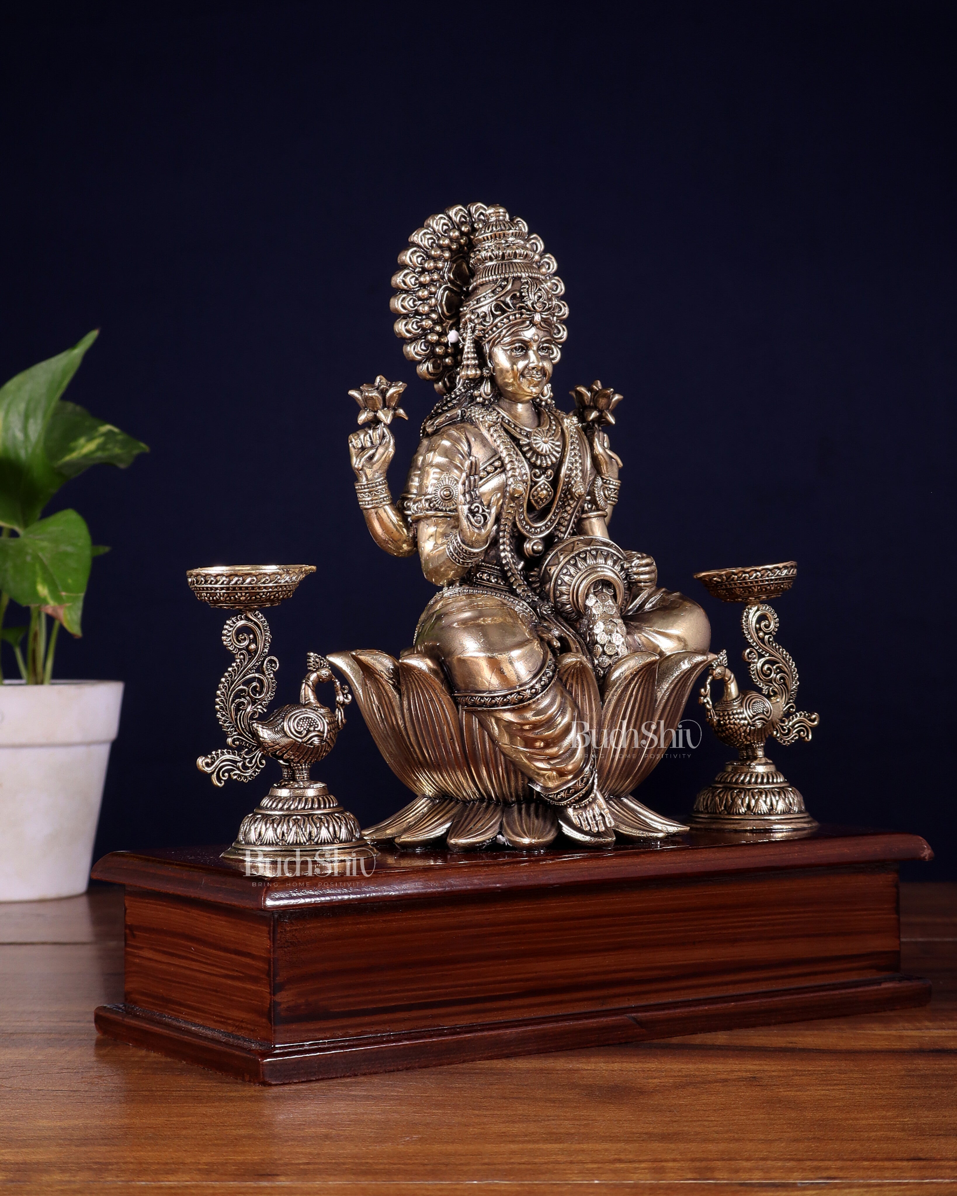 Brass Superfine Goddess Lakshmi Idol with Twin Peacock Lamps on Wooden Base – 9.5 Inch